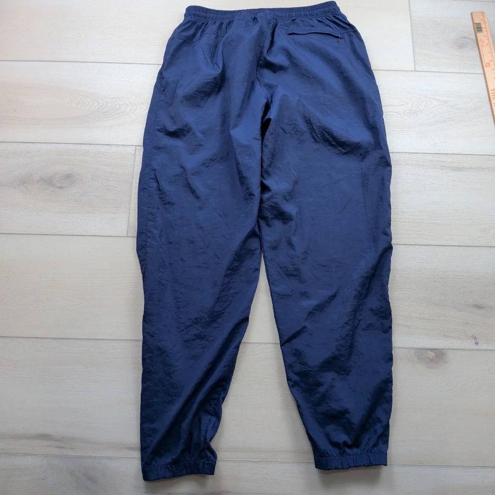 Vintage 90s Nike Men XL Navy Blue Nylon Windbreaker Track Pants Swoosh Ankle Zip